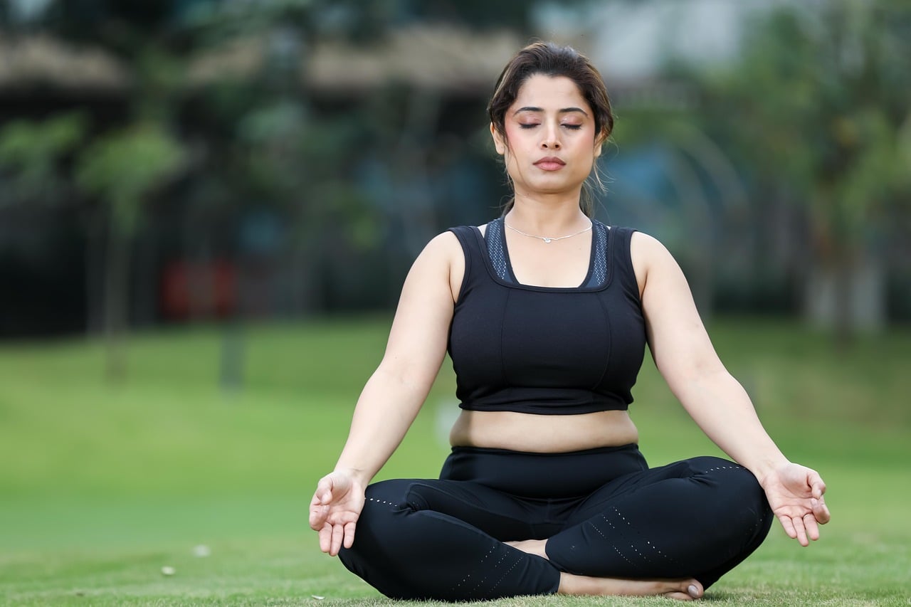 Woman, yoga, meditation — Dr Hazem Afifi Role at Valley Health Physician Alliance: Advancing Surgical Excellence