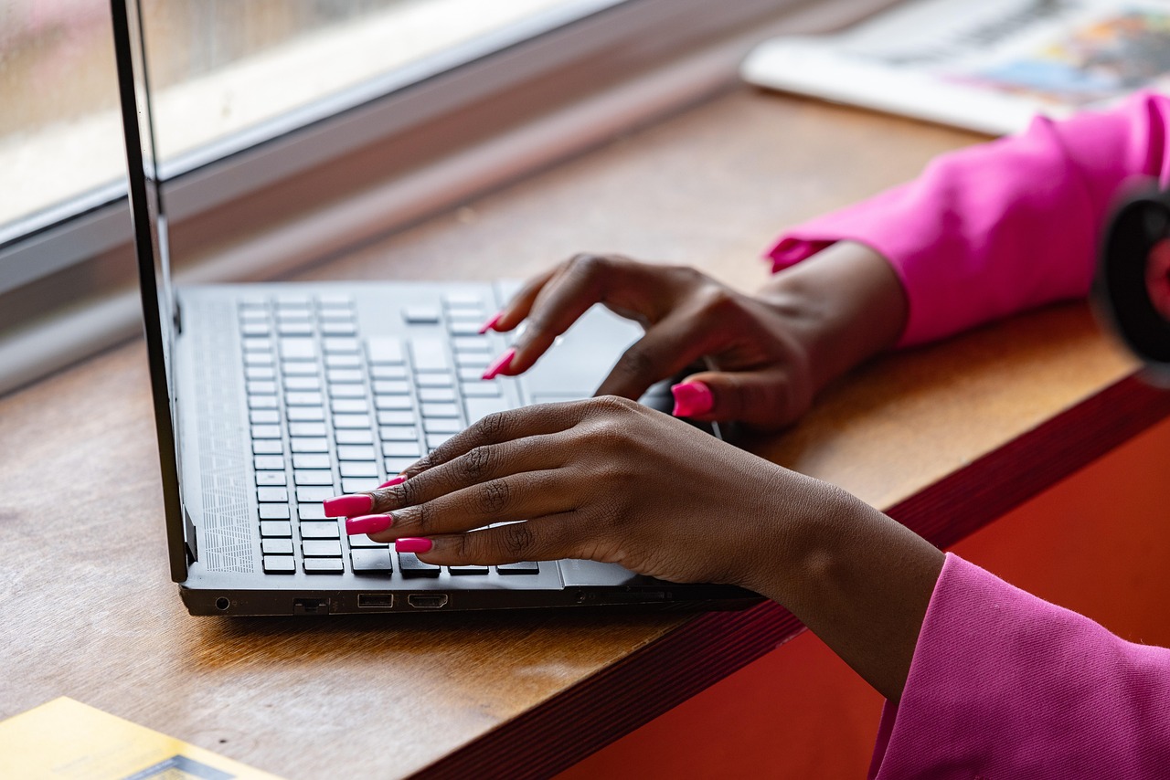 Laptop, typing, working — Undressing AI - advanced deep learning tool